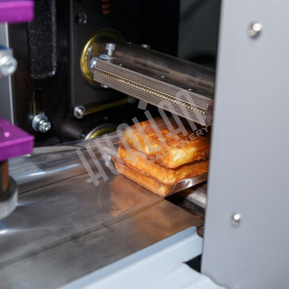 Горизонтальная упаковочная машина DXDZ-250XD (лент. 60 мм, рег. форм., S 250, L 120-280, H 60) Hualian - Купить с доставкой по всему Казахстану