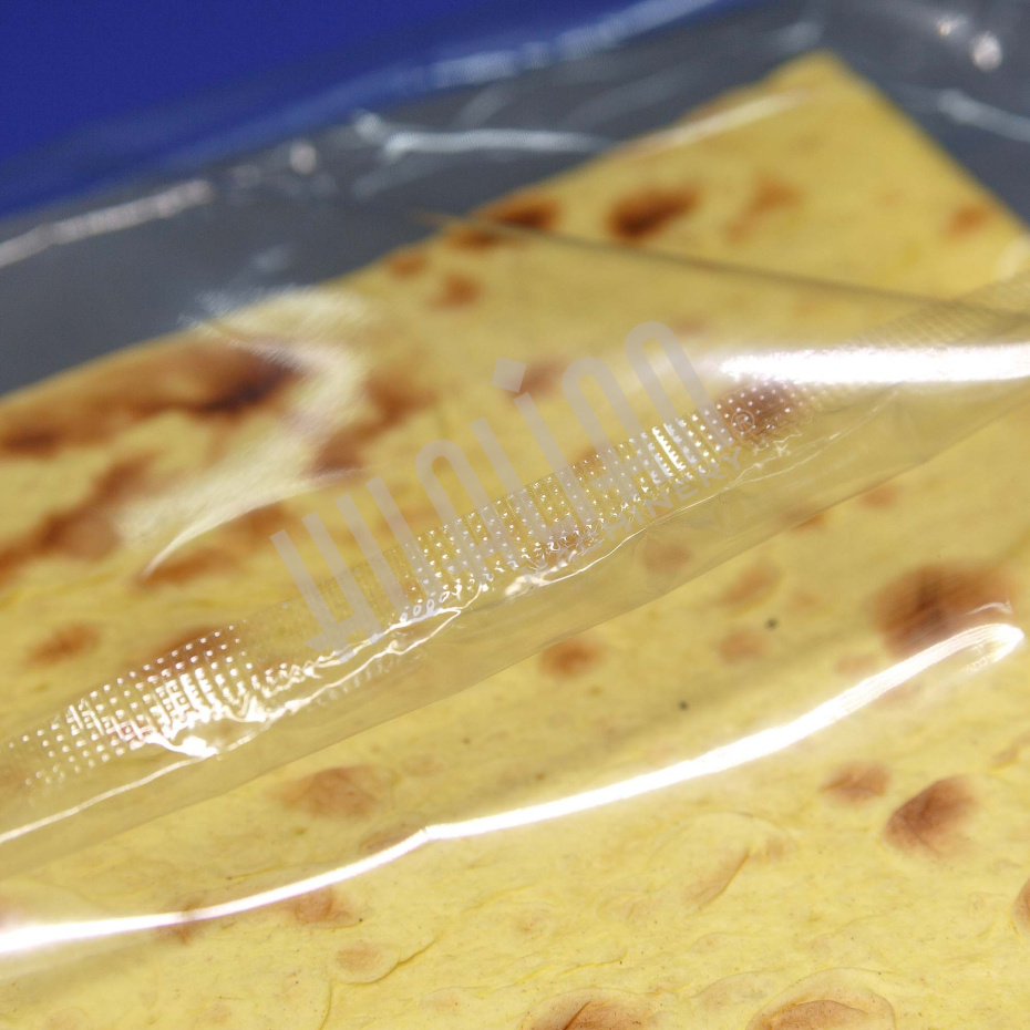 Горизонтальная упаковочная машина DXDZ-600XD (лент. 250 мм, рег.форм., S 400, L 180-500, H-120, трансп.попереч.запайки) Hualian - Купить с доставкой по всему Казахстану