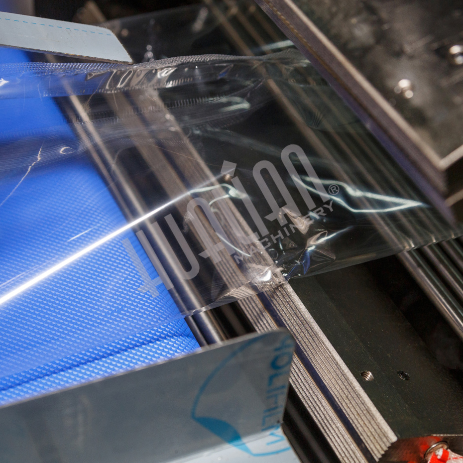 Горизонтальная упаковочная машина DXDZ-600XD (3 серв., H-110 мм, L не огр., W 145-285 мм, HL-1108, круг. отв., подбой, прок. пакета) Hualian - Купить с доставкой по всему Казахстану