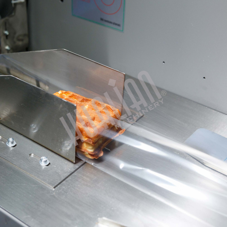 Горизонтальная упаковочная машина DXDZ-250XD (лент. 60 мм, рег. форм., S 250, L 120-280, H 60) Hualian - Купить с доставкой по всему Казахстану