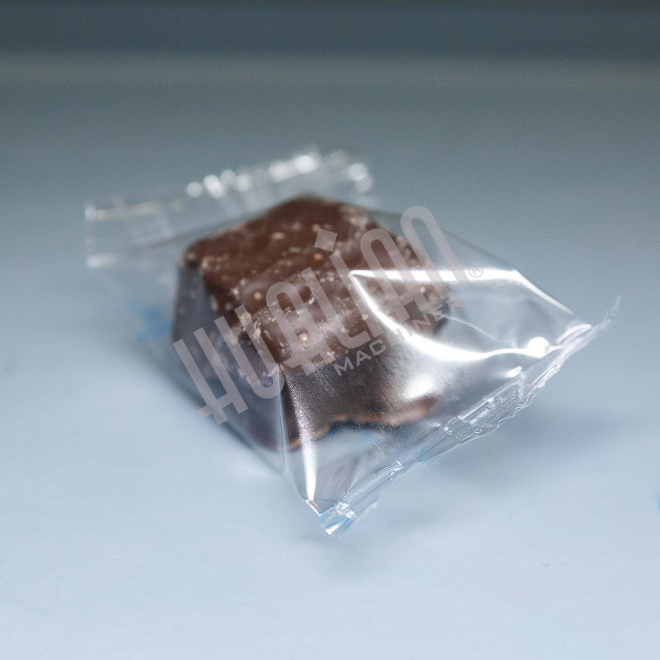 Автоматическая горизонтальная упаковочная машина DXDZ-250B (3 servo, рег. форм., min bag L 65, S 200, H 40, 2-х позиц. нож) Hualian - Купить с доставкой по всему Казахстану