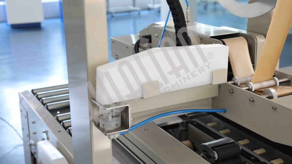 Автоматический заклейщик коробов с активируемой водой лентой FXW-6050 Hualian - Купить с доставкой по всему Казахстану