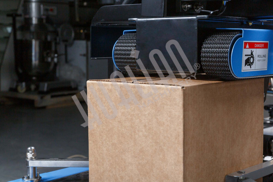 Полуавтоматический заклейщик коробов FXJ-6050С Hualian - Купить с доставкой по всему Казахстану