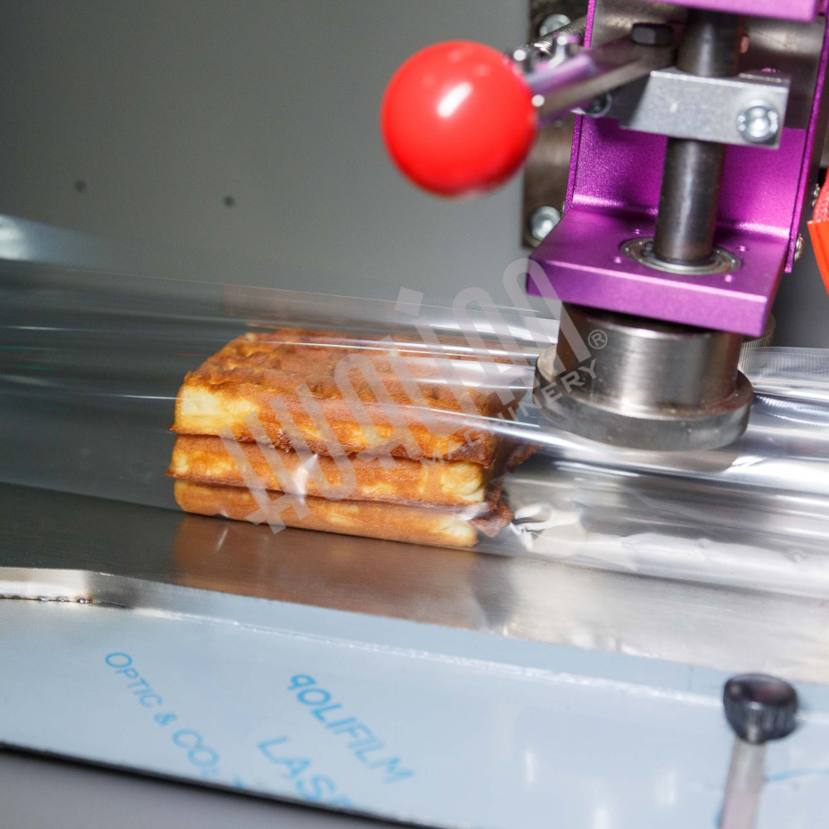 Горизонтальная упаковочная машина DXDZ-250XD (лент. 60 мм, рег. форм., S 250, L 120-280, H 60) Hualian - Купить с доставкой по всему Казахстану