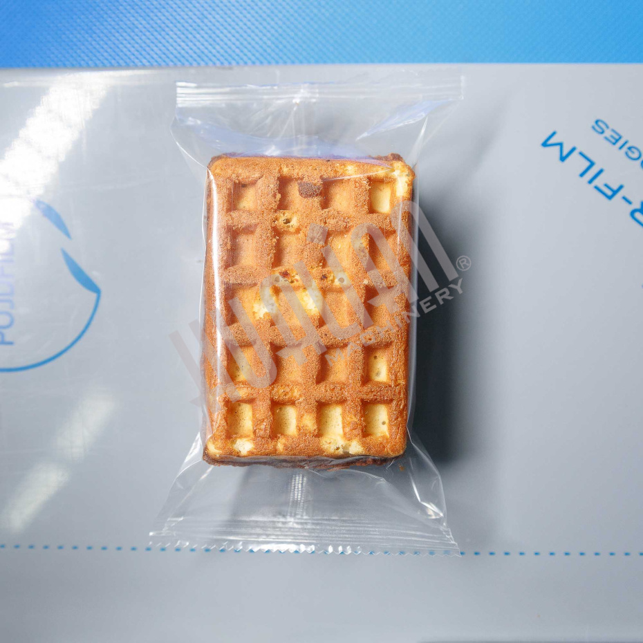 Горизонтальная упаковочная машина DXDZ-250XD (лент. 60 мм, рег. форм., S 250, L 120-280, H 60) Hualian - Купить с доставкой по всему Казахстану