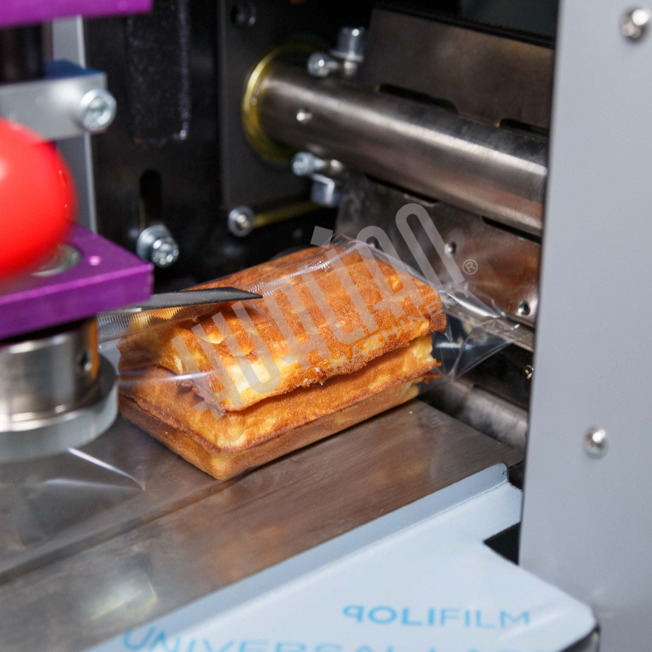 Горизонтальная упаковочная машина DXDZ-250XD (лент. 60 мм, рег. форм., S 250, L 120-280, H 60) Hualian - Купить с доставкой по всему Казахстану