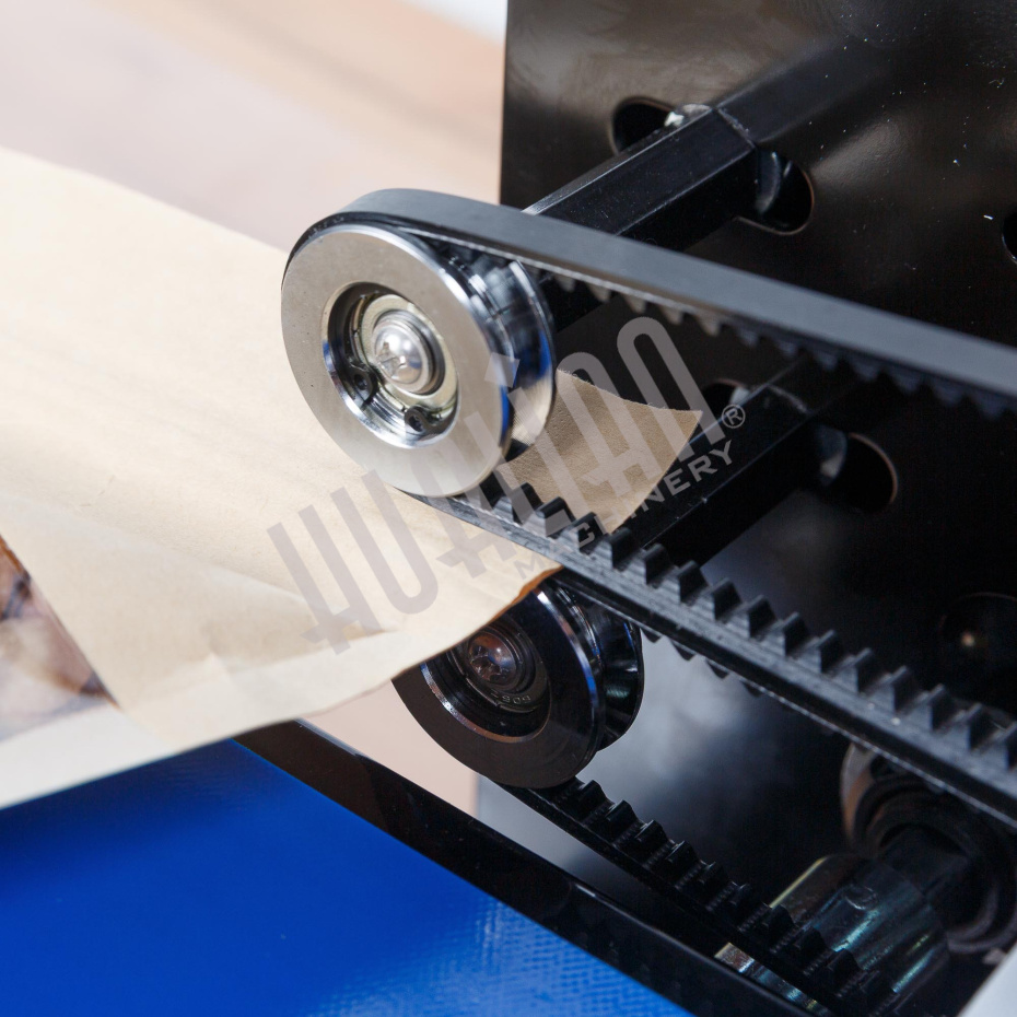 Роликовый (конвейерный) запайщик с правой подачей FRD-750E (горизонт.) Hualian - Купить с доставкой по всему Казахстану