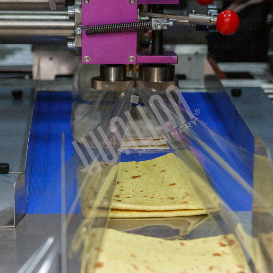 Горизонтальная упаковочная машина DXDZ-600XD (3 серв., H-110 мм, L не огр., W 145-285 мм, HL-1108, круг. отв., подбой, прок. пакета) Hualian - Купить с доставкой по всему Казахстану