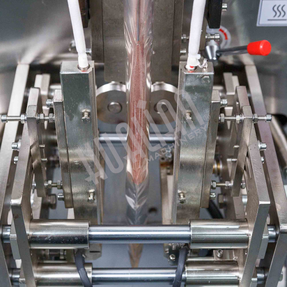 Машина для упаковки трудно-сыпучих продуктов и порошков DXDF-100AX (15-100 мл,4-х шовн., шир.пленки 240 мм, насечка, датер HP-241G, зубчатый нож, шов  Hualian - Купить с доставкой по всему Казахстану