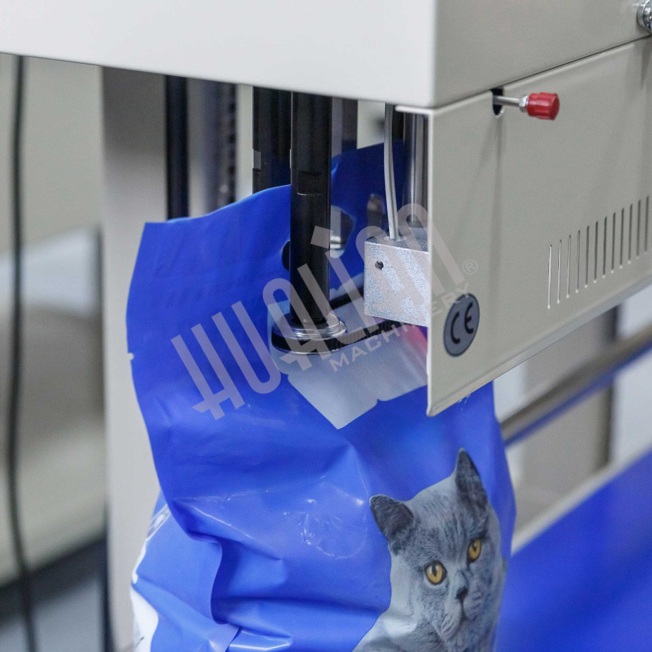 Роликовый конвейерный запайщик FRM-1370LD Hualian - Купить с доставкой по всему Казахстану