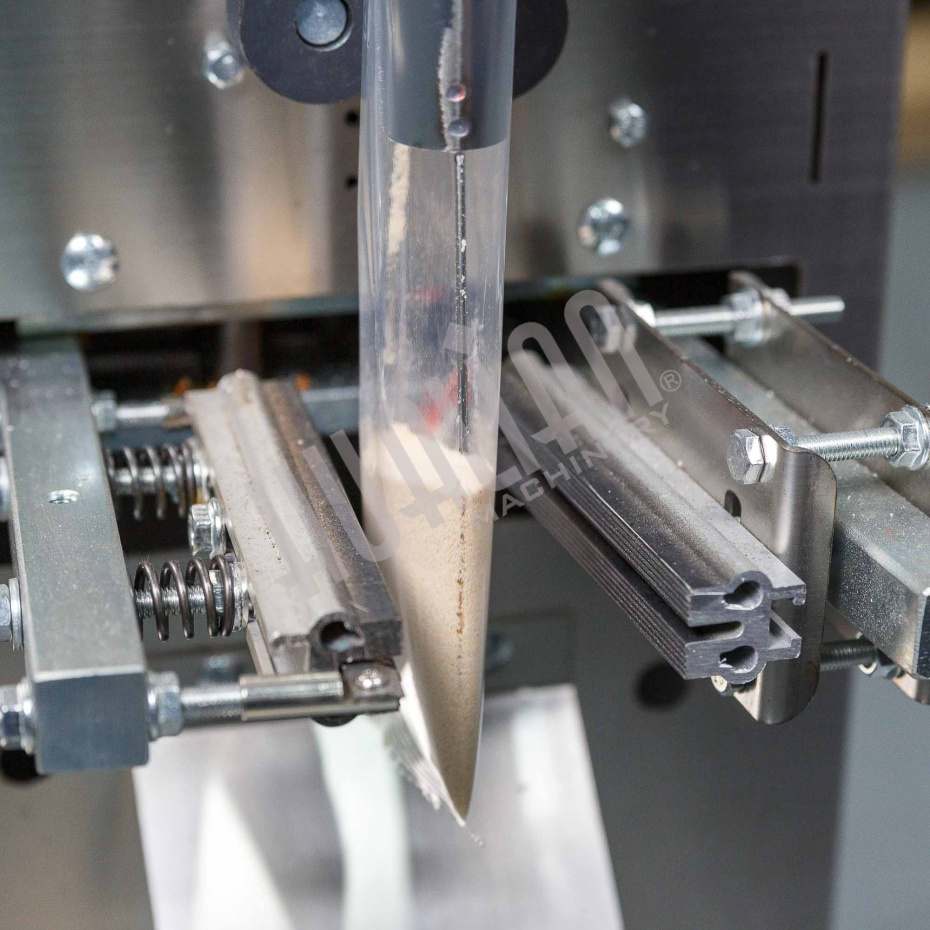 Автоматическая фасовочно-упаковочная машина DXDK-100 NEW (пакет подушка, ширина пленки 140 мм) Hualian - Купить с доставкой по всему Казахстану