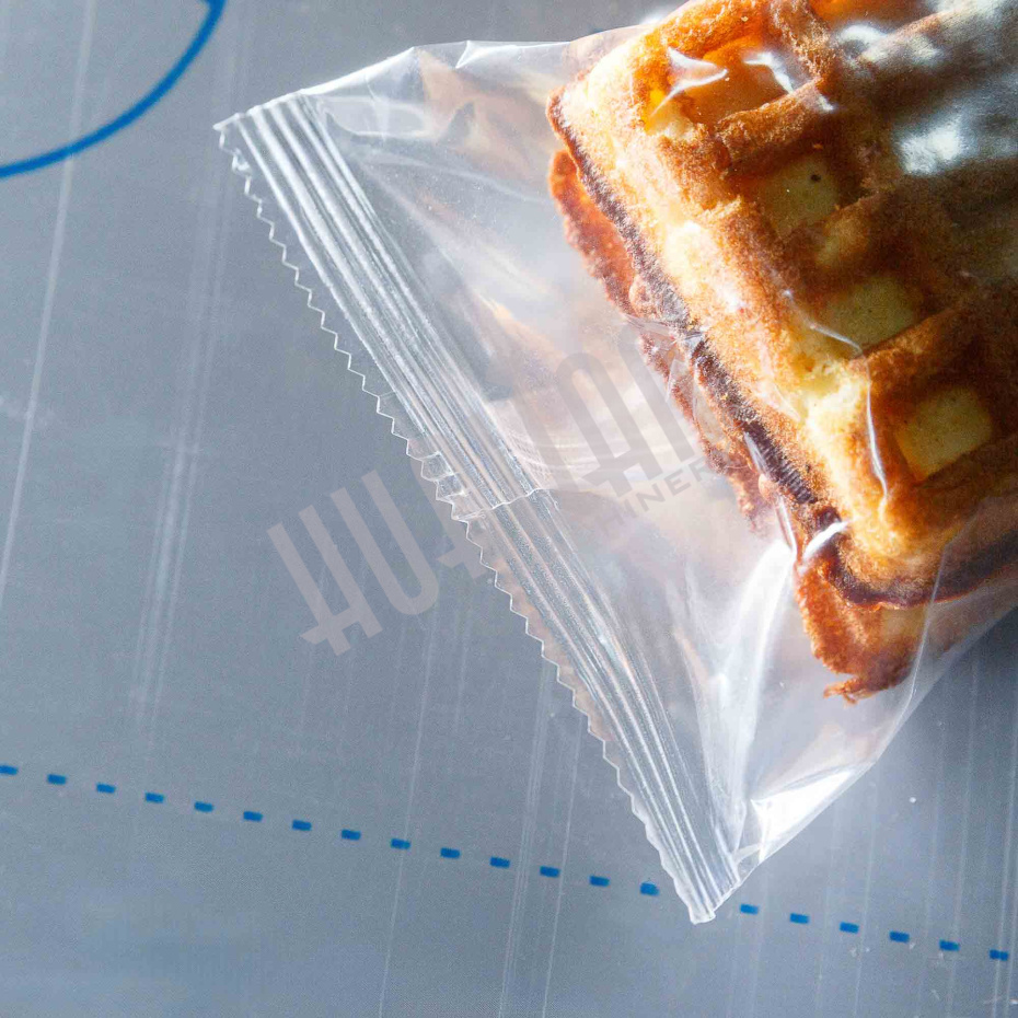 Горизонтальная упаковочная машина DXDZ-250XD (лент. 60 мм, рег. форм., S 250, L 120-280, H 60) Hualian - Купить с доставкой по всему Казахстану