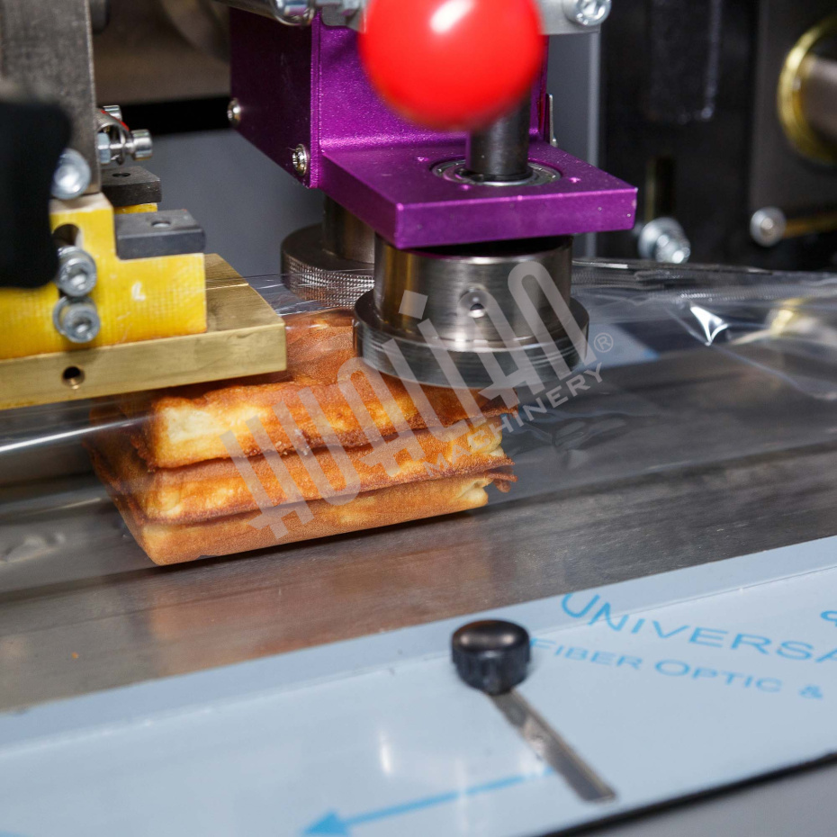 Горизонтальная упаковочная машина DXDZ-250XD (лент. 60 мм, рег. форм., S 250, L 120-280, H 60) Hualian - Купить с доставкой по всему Казахстану