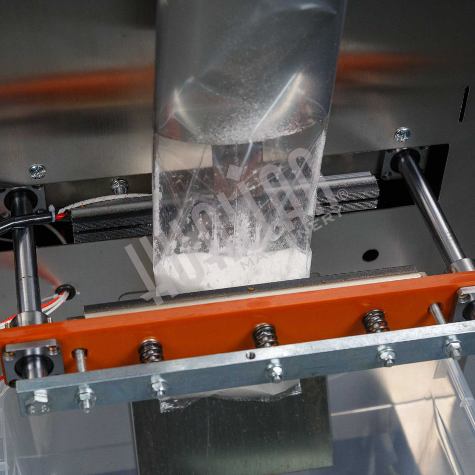 Автоматическая фасовочно-упаковочная машина DXDK-1000 NEW (пакет подушка, ширина пленки 300 мм, фотодатчик) Hualian - Купить с доставкой по всему Казахстану