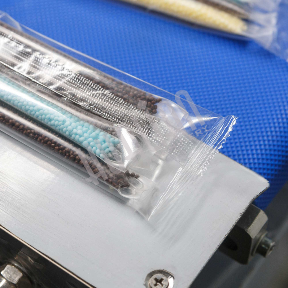 Горизонтальная упаковочная машина DXDZ-250XD  (H-40мм, bag L 65-190mm, S 200mm, регулируемый формирователь, вставки в транспортере) Hualian - Купить с доставкой по всему Казахстану