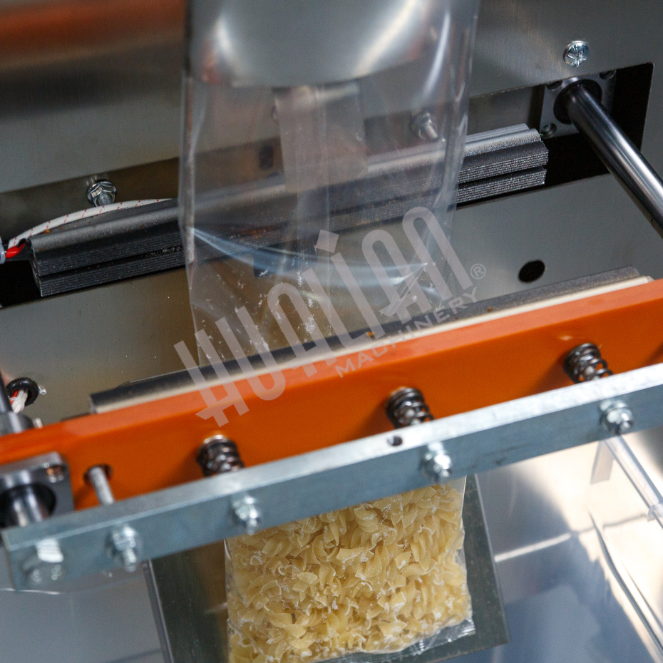 Автоматическая фасовочно-упаковочная машина DXDK-1000 NEW (пакет-подушка,W пленки 420 мм,фотодатчик) Hualian - Купить с доставкой по всему Казахстану