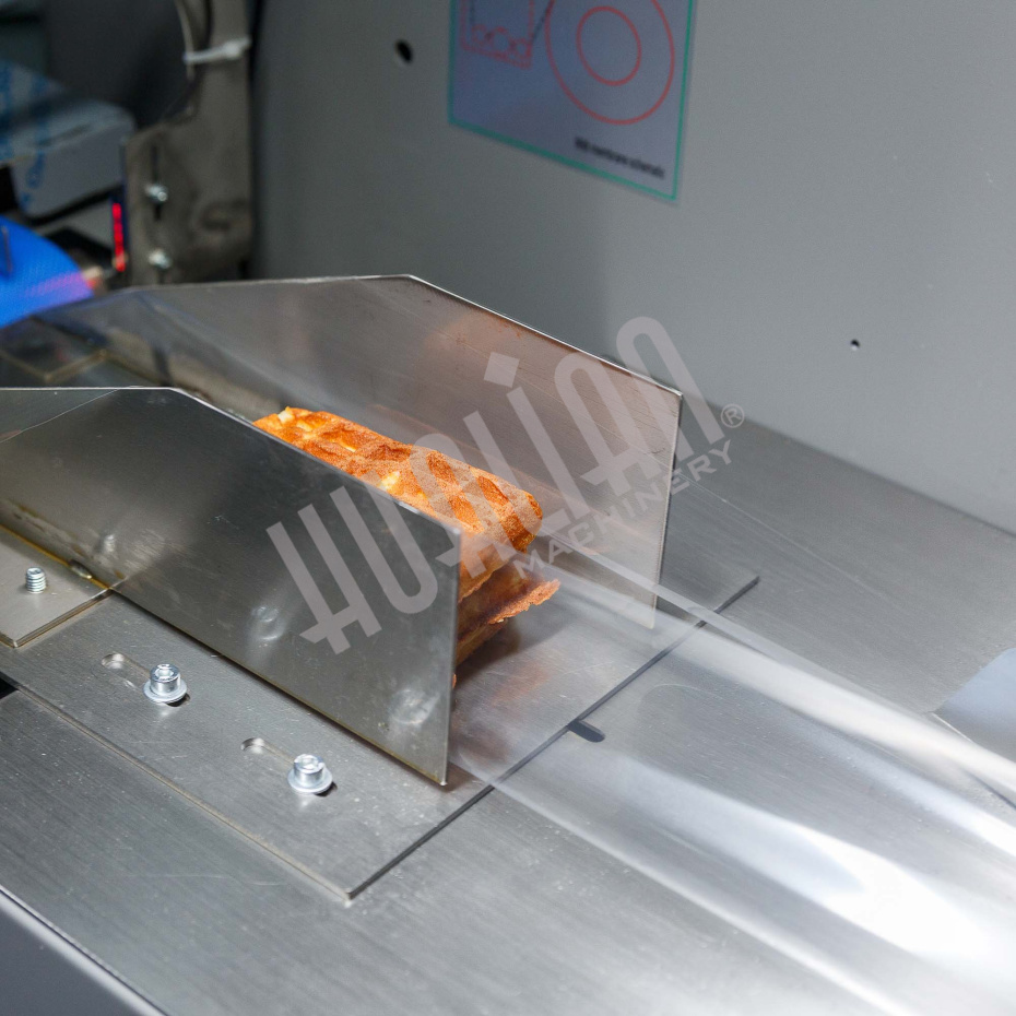 Горизонтальная упаковочная машина DXDZ-250XD (лент. 60 мм, рег. форм., S 250, L 120-280, H 60) Hualian - Купить с доставкой по всему Казахстану