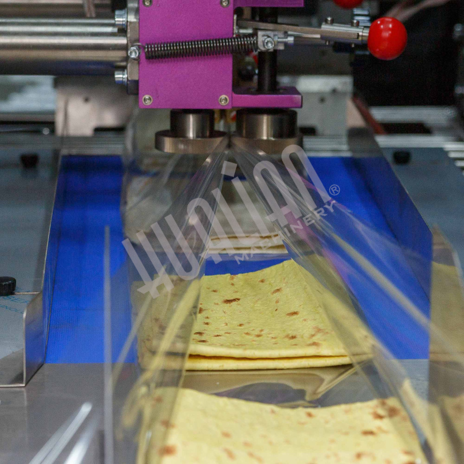 Горизонтальная упаковочная машина DXDZ-600XD (лент. 250 мм, рег.форм., S 400, L 180-500, H-120, трансп.попереч.запайки) Hualian - Купить с доставкой по всему Казахстану