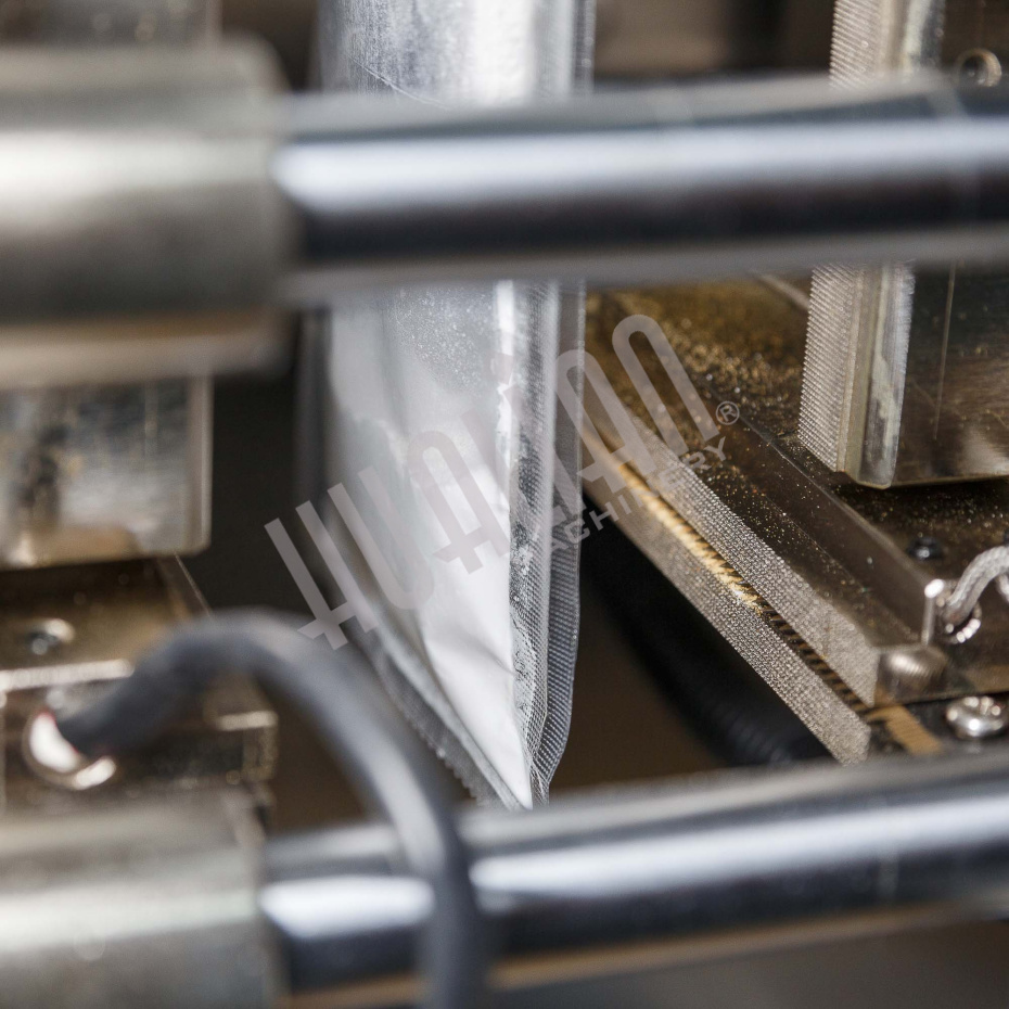 Машина для упаковки трудно-сыпучих продуктов и порошков DXDF-100AX (15-100 мл,4-х шовн., шир.пленки 240 мм, насечка, датер HP-241G, зубчатый нож, шов  Hualian - Купить с доставкой по всему Казахстану