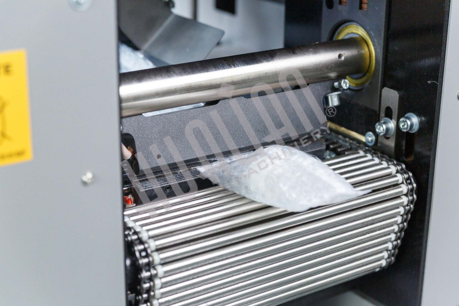 Автоматическая горизонтальная упаковочная машина DXDZ-350XD под ВПП (3 servo, лент.150 мм, рег.форм., min bag L 120, H 50, трансп.попереч.запайки) Hualian - Купить с доставкой по всему Казахстану