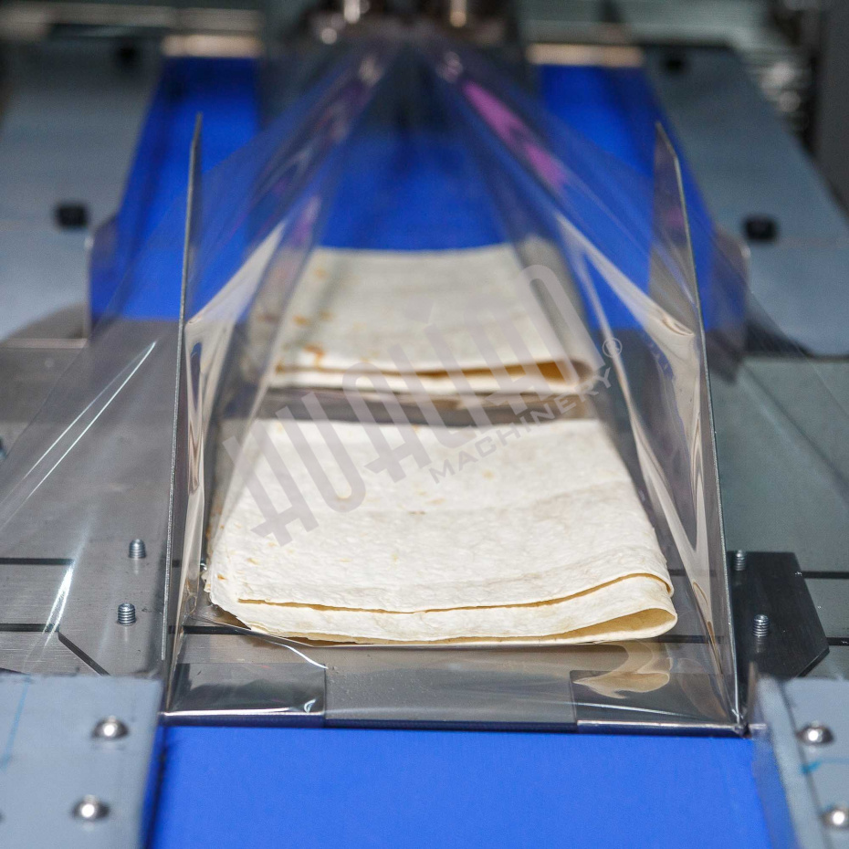 Горизонтальная упаковочная машина DXDZ-600XD (лент. 250 мм, рег.форм., S 400, L 180-500, H-120, трансп.попереч.запайки) Hualian - Купить с доставкой по всему Казахстану