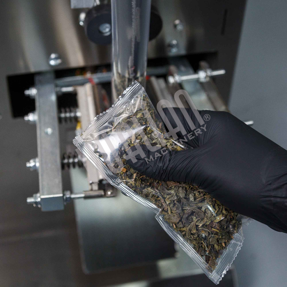 Автоматическая фасовочно-упаковочная машина DXDK-100 NEW (пакет подушка, ширина пленки 140 мм) Hualian - Купить с доставкой по всему Казахстану