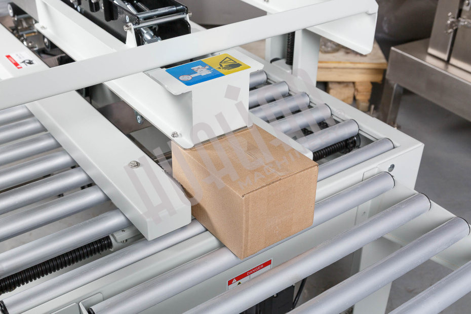 Полуавтоматический заклейщик коробов FXJ-2550X Hualian - Купить с доставкой по всему Казахстану