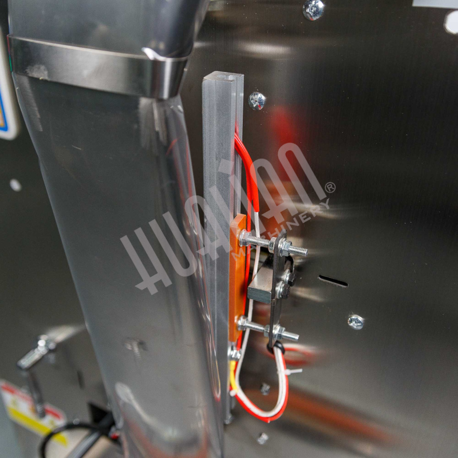 Автоматическая фасовочно-упаковочная машина DXDK-1000 NEW (пакет подушка, ширина пленки 300 мм, фотодатчик) Hualian - Купить с доставкой по всему Казахстану