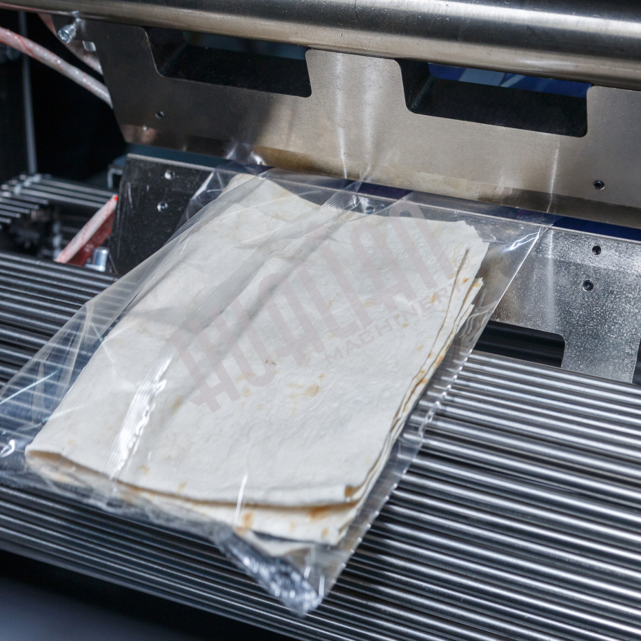 Горизонтальная упаковочная машина DXDZ-600XD (3 серв., H-110 мм, L не огр., W 145-285 мм, HL-1108, круг. отв., подбой, прок. пакета) Hualian - Купить с доставкой по всему Казахстану