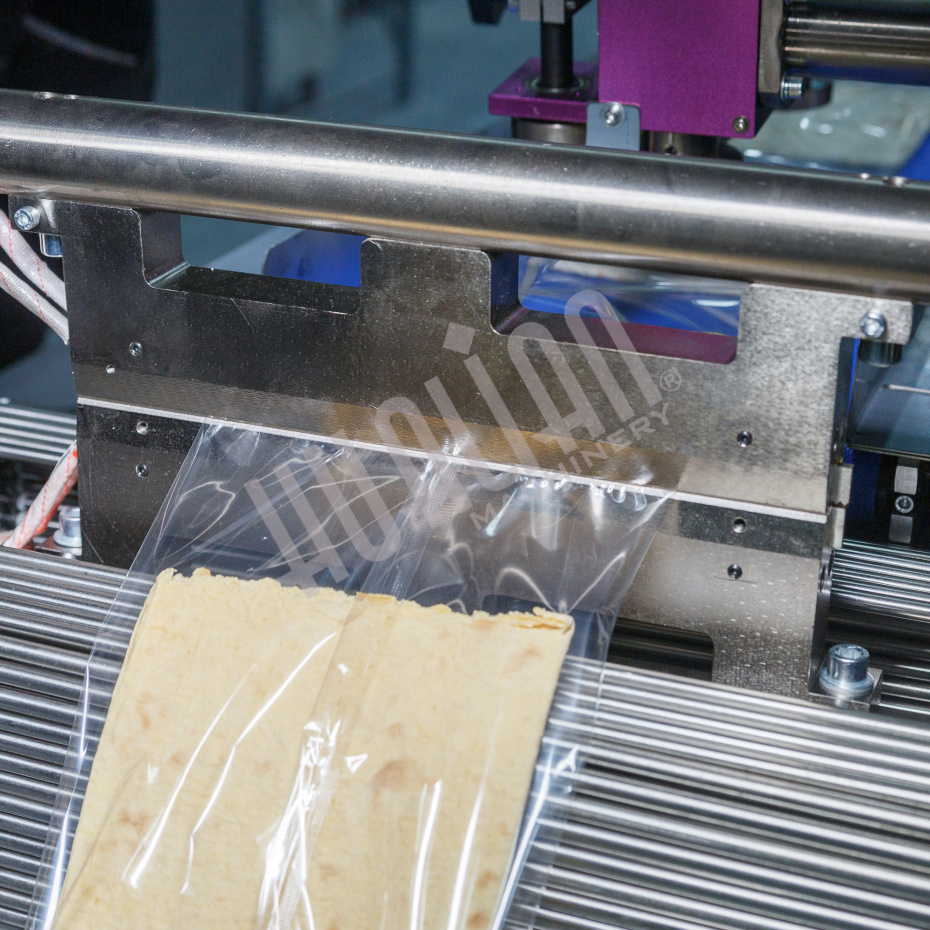 Горизонтальная упаковочная машина DXDZ-600XD (3 серв., H-110 мм, L не огр., W 145-285 мм, HL-1108, круг. отв., подбой, прок. пакета) Hualian - Купить с доставкой по всему Казахстану