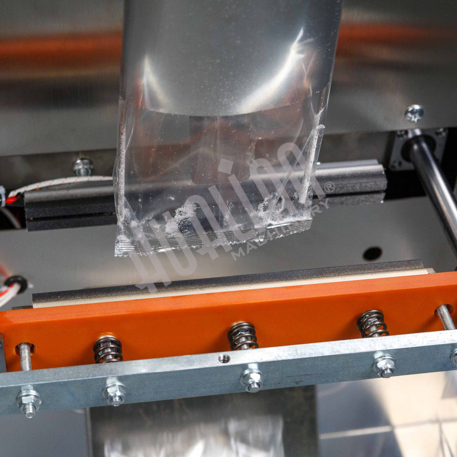 Автоматическая фасовочно-упаковочная машина DXDK-1000 NEW (пакет подушка, ширина пленки 300 мм, фотодатчик) Hualian - Купить с доставкой по всему Казахстану