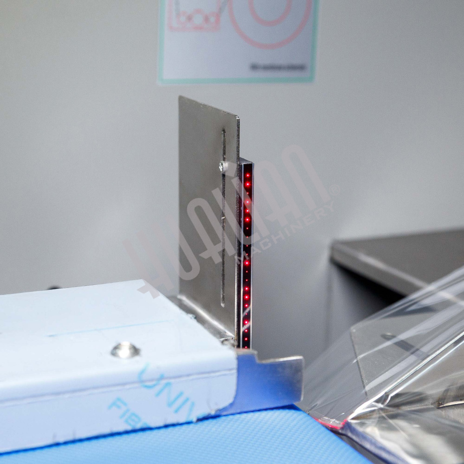 Горизонтальная упаковочная машина DXDZ-600XD (лент. 250 мм, рег.форм., S 400, L 180-500, H-120, трансп.попереч.запайки) Hualian - Купить с доставкой по всему Казахстану