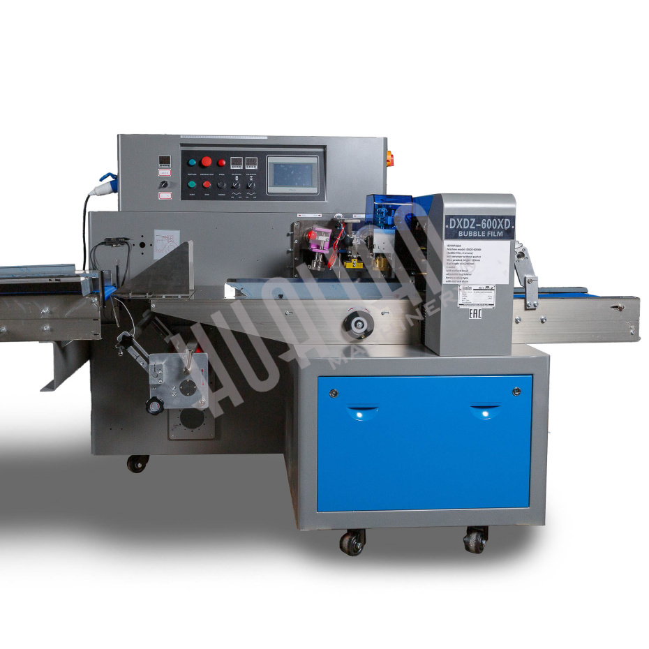 Автоматическая горизонтальная упаковочная машина DXDZ-600XD под ВПП (3 servo, лент. 250 мм, рег. форм., min bag L 130, H 120, трансп.попереч.запайки) Hualian - Купить с доставкой по всему Казахстану