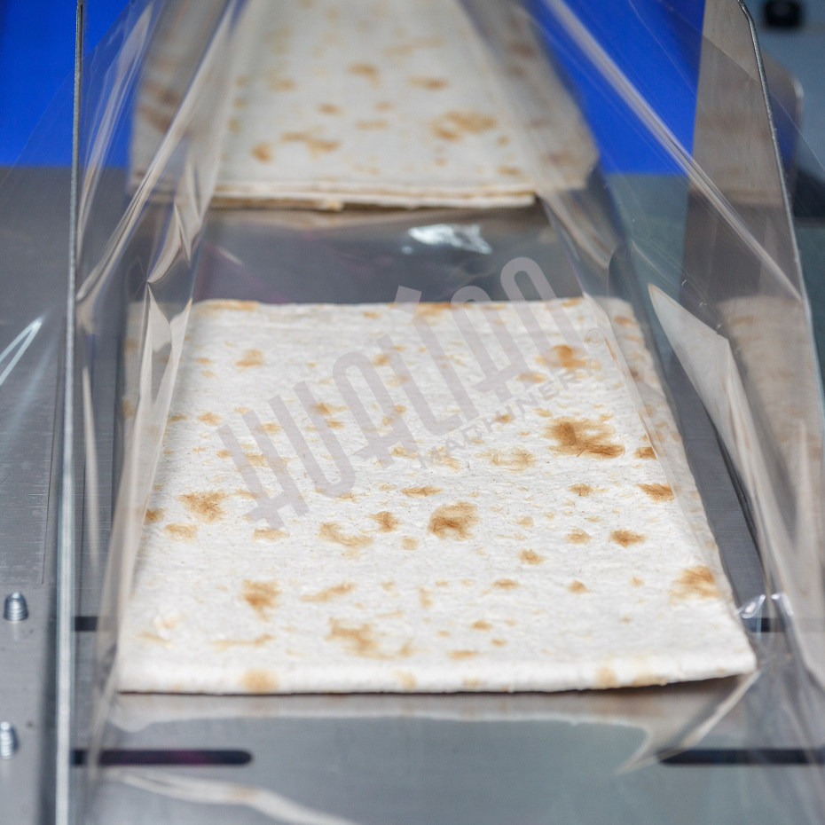 Горизонтальная упаковочная машина DXDZ-600XD (3 серв., H-110 мм, L не огр., W 145-285 мм, HL-1108, круг. отв., подбой, прок. пакета) Hualian - Купить с доставкой по всему Казахстану