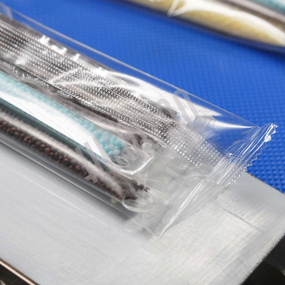 Горизонтальная упаковочная машина DXDZ-250XD  (H-40мм, bag L 65-190mm, S 200mm, регулируемый формирователь, вставки в транспортере) Hualian - Купить с доставкой по всему Казахстану